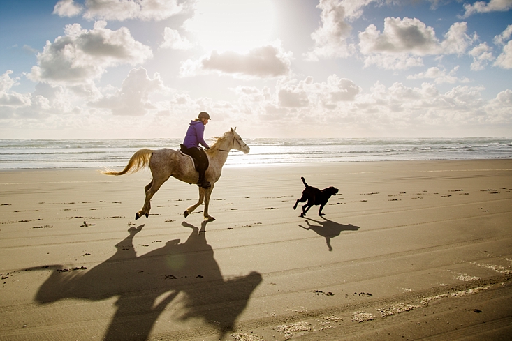 Holly riding Ace, Wally running along side